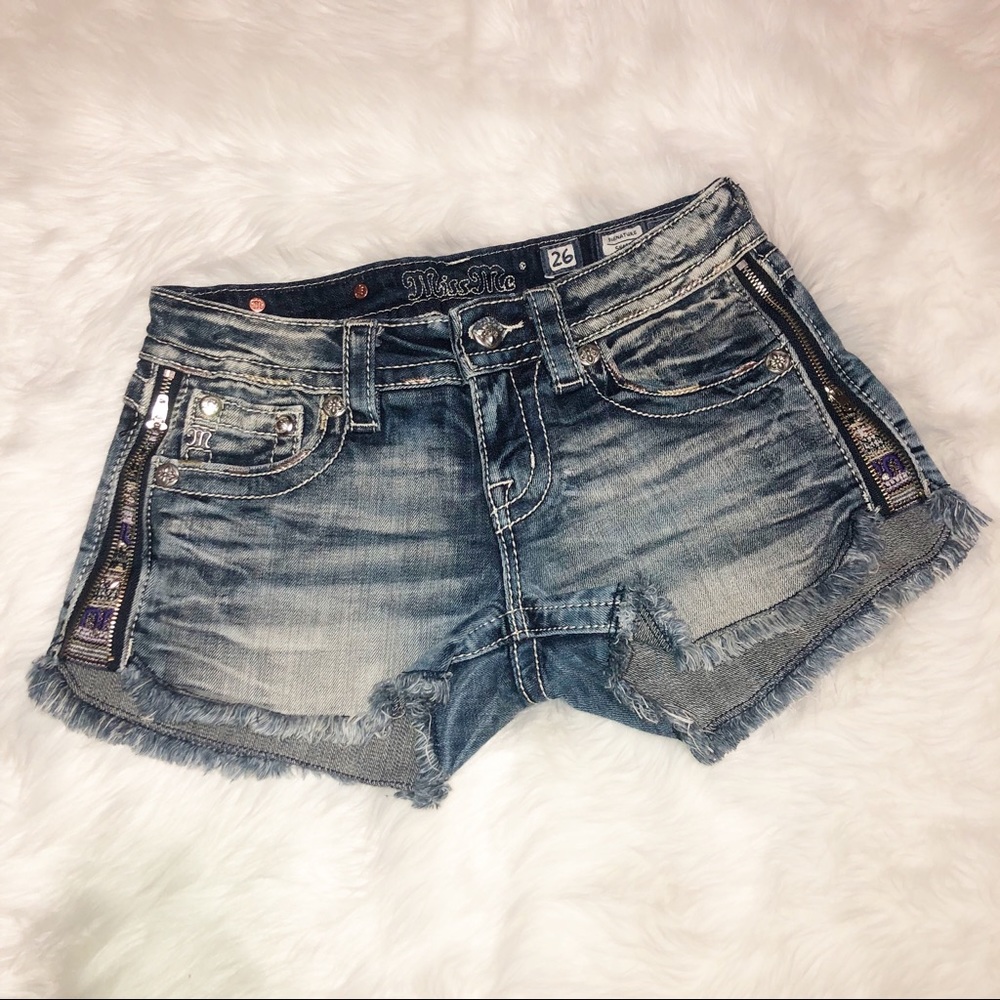 Miss Me Blue Jean Shorts size 26 with Silver Accents with zippers on the side.